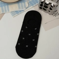 Black low-cut invisible boat socks with white bow patterns and non-slip silicone design - One Size / Black