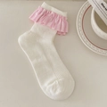 White ribbed mid-calf socks with pink striped ruffle trim in sweet ballet core style - White