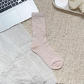 Sweet apricot crew socks with lace trim and hollow-out floral patterns on a cozy rug - One Size / Light Pink Hollow Knit Flat Style