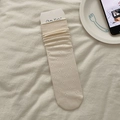 Calcetines beige calados con delicado patrón floral de malla y puños acanalados - Beige