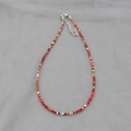 Detail of colorful bohemian seed bead necklace featuring adjustable lobster clasp - Red Pink White Gold (11)
