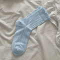 Light blue knit crew socks with diamond patterns and delicate ruffled cuffs - Blue