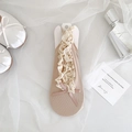 Beige ballet socks with lace trim and bow knot displayed on white tulle background - One Size / Deep Skin