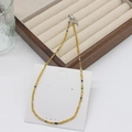 Handmade bohemian beaded necklace in transparent yellow with blue accents and silver clasp - Amber Blue Gold (22)