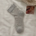 Grey ballet-style knit socks with hollow floral patterns and ribbed cuff details - One Size / Gray