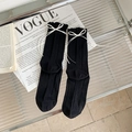 Schwarze Ballettsocken mit Rüschenrand, weißen Schleifen und vertikalem Rippstrickmuster - Einheitsgröße / Schwarz