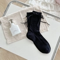 Chaussettes noires avec dentelle et nœud en ruban de soie style Lolita romantique - Taille unique / Noir