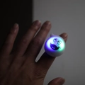 Ghost glowing ring toy with LED light effect and cute spooky face for kids party - Ghost Smile Ring