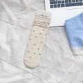 Beige floral crew socks with gray flower patterns and rolled cuffs for women - Off-white Allover Small Flower