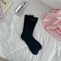 Sweet black crew socks with bow detail, heart hollow mesh and wavy ruffle cuff for women - One Size / Black