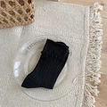 Calze nere da donna con bordo a volant ed elegante trama a coste verticali - Taglia unica / Nero