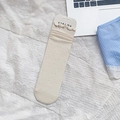 Cream white knit crew socks featuring butterfly jacquard pattern and ruffled edges - Off-white Butterfly Jacquard