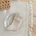 Beige mesh crew socks with vertical stripes and ruffled edges on a glass tray - One Size / Brown