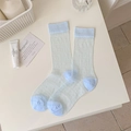 Chaussettes en résille bleu clair avec jacquard blanc vintage et bords-côtes élastiques - Bleu