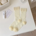 Calcetines jacquard amarillo pálido con textura de malla geométrica y borde sólido - Amarillo