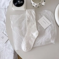 White crew socks featuring mesh hollow knit and vertical stripes in a minimalist style - One Size / White