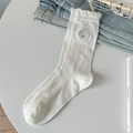 White crew socks with cute dog embroidery, frill cuffs, and bow jacquard pattern - One Size / Creamy White