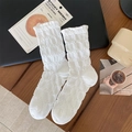 Sweet white ruffled crew socks with a bubble texture design for a trendy college look - One Size / Bleached White