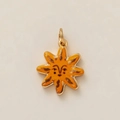 Detail of golden sun pendant with yellow enamel inlay and minimalist face design - Yellow Sun Pendant