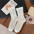 Japanese style white mid-calf socks with textured bubble pattern and ruffled design - One Size / Creamy White