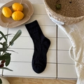 Breathable black mid-calf socks with dot texture and striped patterns on white background - One Size / Black