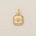 Macro detail of gold-plated octagonal Evil Eye pendant with sparkling zircon accents - Eye