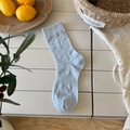 Light blue hollow floral crew socks with breathable mesh pattern and ribbed cuffs - One Size / Blue