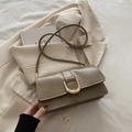 Olive green vintage flap shoulder bag with gold horseshoe buckle on cream blazer - Olive Green
