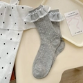 Gray women's crew socks with white lace trim and hollow out knit pattern in JK style - One Size / Gray