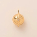 Detail of 18K gold sphere pendant with high polish and octagonal star zircon inlay - North Star Charm Only