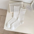 Minimalist white crew socks with pointelle knit texture and vertical ribbed stripes - One Size / White