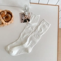 White JK style knit slouch socks with ribbed texture for girls in a minimalist setting - One Size / White