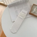 White ballet-style crew socks featuring hollow heart patterns and ruffled cuffs - One Size / White