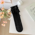 Elegant black lace calf-high socks featuring ruffles and a silk bow decoration - One Size / Black