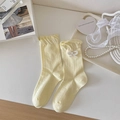 Calze giallo chiaro con bordi a balze e dettagli eleganti di perle e fiocchi - Taglia unica / Giallo