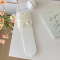 White Lolita calf socks featuring lace trim, heart cutouts and delicate ribbon bows - One Size / Beige
