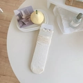 Creamy white ballet-style crew socks with bow jacquard pattern and ruffled edges - One Size / Beige