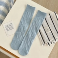 Light blue slouch socks with hollow diamond knit patterns and elastic ribbed cuffs - One Size / Blue