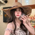 Wide brim straw sun hat with yellow ribbon and black cursive embroidery for beach - Khaki Raw Edge Letter Straw Hat (D-378)