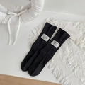 Sweet Korean style black ribbed crew socks with a Lucky tag for women and girls - One Size / Black