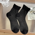 Elegant black ruffle cuff crew socks with breathable mesh texture and sheer stripes - Black