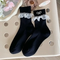 Calze nere dolci con bordo in pizzo bianco e dettaglio chic con fiocco di perle - Taglia unica / Nero