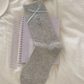 Light gray mid-calf socks with light blue ribbon bow and decorative blue buttons - One Size / Gray