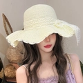 Beige wide-brim straw sun hat featuring a large white lace bow for beach summer vacation - Off White (D-217)