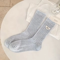 Light blue ribbed crew socks featuring a stylish white triangle patch and trendy lettering - One Size / Blue
