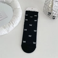 Sweet black mid-calf socks with white bow prints and elegant ruffled lettuce edges - Black