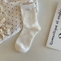 White crew socks with delicate butterfly jacquard and rib knit cuffs for women - One Size / Bleached White