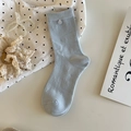 Light blue crew socks with butterfly pattern and decorative shell button detail - One Size / Blue