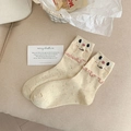 Beige crew socks with colorful speckles, pink lettuce edge, and cute cartoon bear embroidery - Face Expression