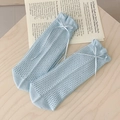 Light blue mesh knit mid-calf socks with elegant white ribbon bow details - One Size / Blue